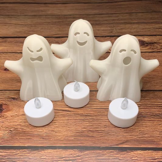 Complete set of white 3D printed spooky, happy, and surprised ghosts with flickering tea lights