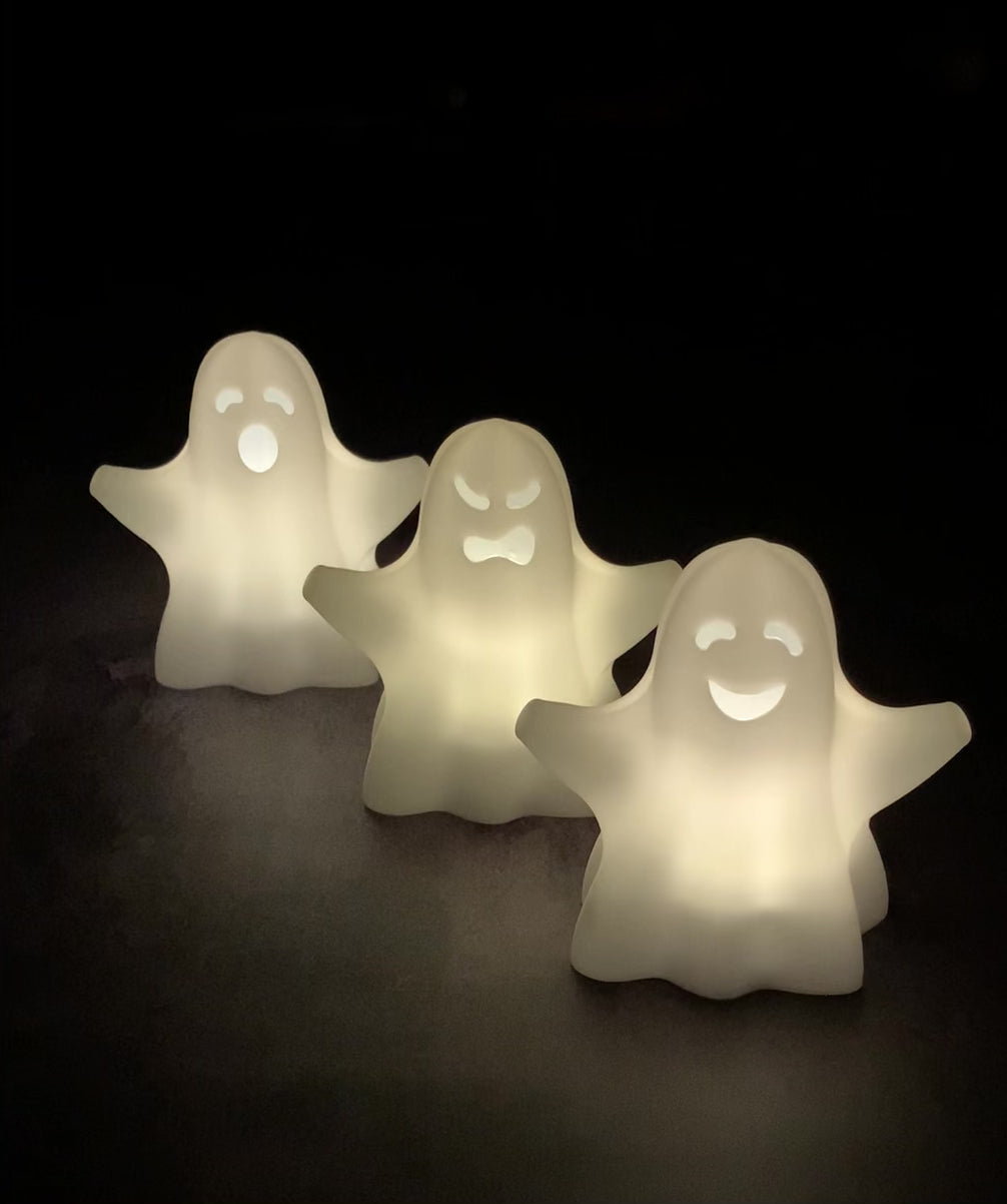 3D Printed halloween decor. Spooky, surprised, happy, friendly, casper, shocked, ghost with flickering tea light candle